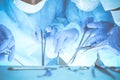 Close-up of medical team performing operation. Group of surgeons at work are busy of patient. Medicine, veterinary or Royalty Free Stock Photo