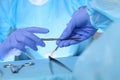 Close up of medical team performing operation. Group of surgeons at work in operating theater Royalty Free Stock Photo