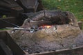 Medieval blacksmith forge with furnace and bellows