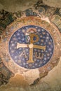 Close-up on medieval colorful mosaic in ruins showing GodÃÂ´s symbol for christians