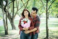 Close-up of a man giving happy woman flowers.A picture of a romantic couple