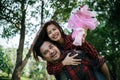 Close-up of a man giving happy woman flowers.A picture of a romantic couple