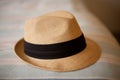 Fedora Hat made of woven straw, lightweight summer protection from the sun Royalty Free Stock Photo