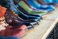 Close up on mens leather shoes in the row Royalty Free Stock Photo