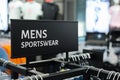 Close up of MENS SPORTSWEAR Sign in the sports clothes superstore