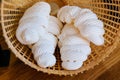 Close up Meringue inside weaving basket. Sweet and melt in your mouth. French, Spanish, Swiss, and Italian cuisine Royalty Free Stock Photo