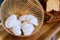 Close up Meringue inside weaving basket. Sweet and melt in your mouth. French, Spanish, Swiss, and Italian cuisine Royalty Free Stock Photo