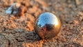 Close-up of a metal ball on the ground Royalty Free Stock Photo