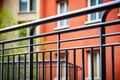 close-up of a metal bauhaus-style balcony railing