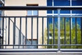 close-up of a metal bauhaus-style balcony railing