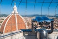 Close up of metal binoculars with dome of Florence cathedral on the background Royalty Free Stock Photo