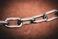 close-up of a metal chain isolated against a diffused background Royalty Free Stock Photo