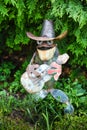 Metal garden statue of frog playing guitar cute Royalty Free Stock Photo