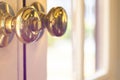 Close up of metal handle on a old wooden door,golden door knob. close up of metal handle on a old wooden door,golden door knob Royalty Free Stock Photo