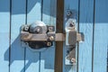 Close Up Of Metal Lock On Blue Door