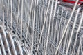 Close Up of The Metal Mesh of Shopping Carts Lined Up in A Row Royalty Free Stock Photo