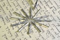 Close-up of metal nibs and old pen on vintage handwriting. Fountain pen on an ancient handwritten letter. Old story Royalty Free Stock Photo