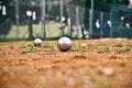 Silver petanque balls on the ground.