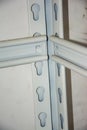 Close up of metal shelf seams, showcasing structural details and connection structures Royalty Free Stock Photo