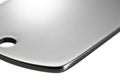 Close-up of a metal surface with a brushed finish. The image showcases a sleek, Royalty Free Stock Photo