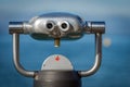 Coin operated binoculars on a blurred background - Sea and sky Royalty Free Stock Photo