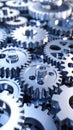 Close-up of metallic gears interlocking in a complex mechanical system, representing industry. Royalty Free Stock Photo