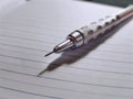 Metallic Mechanical Pencil on Foolscap Paper Royalty Free Stock Photo