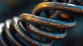 Close up of Metal Spring With Rusted Orange and Blue Coloring Outdoors Royalty Free Stock Photo