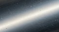 Close-up of a metallic surface with a brushed texture. The surface Royalty Free Stock Photo