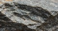 Close-up of a metamorphic rock surface, showing layers of finely grained, interlocking Royalty Free Stock Photo