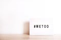 Close up of ` METOO` text in lightbox. Female empowering educational movement.