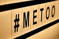 Close up of ` METOO` text in lightbox. Female empowering educational movement.