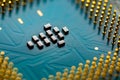 Close up of microchips and pins on Main CPU PC processor circuit board Royalty Free Stock Photo