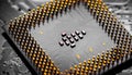Close up of microchips and pins on Main CPU PC processor circuit Royalty Free Stock Photo