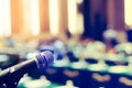 Close up of microphone in concert hall or conference room Royalty Free Stock Photo