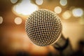 Close up of microphone in concert hall or conference room with l Royalty Free Stock Photo