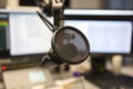 Close-up of a microphone in radio station broadcasting studio Royalty Free Stock Photo