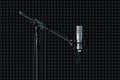 Close up of microphone set up isolated on black background. 3d rendering. Royalty Free Stock Photo