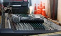 Close-up microphone and sound mixer control indoor audio system. Royalty Free Stock Photo