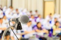 Close up microphone stand on the table in the conference and Background blur interior seminar meeting room Royalty Free Stock Photo