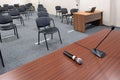 Close up Microphone on the table, concept of speaker or teacher preparation to speak in seminar class room