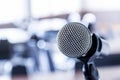 Close up microphone with tripod on stage in seminar room Royalty Free Stock Photo