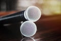 Close up Microphone voice speaker on dark background. radio microphones. wireless sound transmission system. soft focus Two mics C Royalty Free Stock Photo