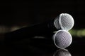Close up Microphone voice speaker on dark background. radio microphones. wireless sound transmission system. soft focus Two mics C Royalty Free Stock Photo