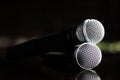 Close up Microphone voice speaker on dark background. radio microphones. wireless sound transmission system. soft focus Two mics C Royalty Free Stock Photo