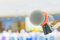 Close up microphone wireless Stand on white table in business conference interior seminar meeting room and Background blur Royalty Free Stock Photo