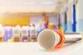 Close up microphone wireless on the white table in business conference interior seminar meeting room Royalty Free Stock Photo