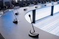 Close-up of microphones in an empty meeting room at a press conference. Royalty Free Stock Photo