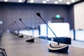 Close-up of microphones in an empty meeting room at a press conference. Royalty Free Stock Photo