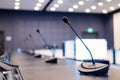 Close-up of microphones in an empty meeting room at a press conference. Royalty Free Stock Photo